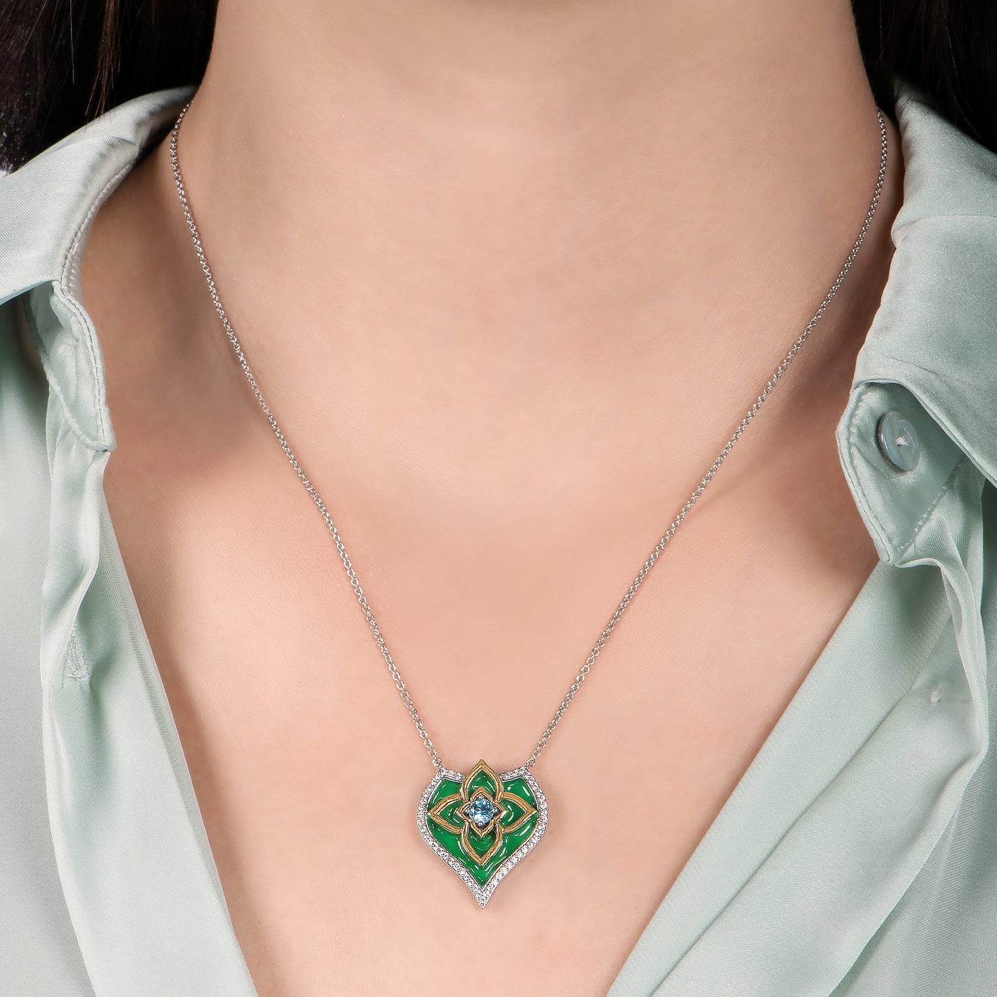 Enchanted Disney Fine Jewelry Sterling Silver and 10K Yellow Gold with 1/5 CTTW Diamond and Swiss Blue Topaz Jasmine Pendant Necklace