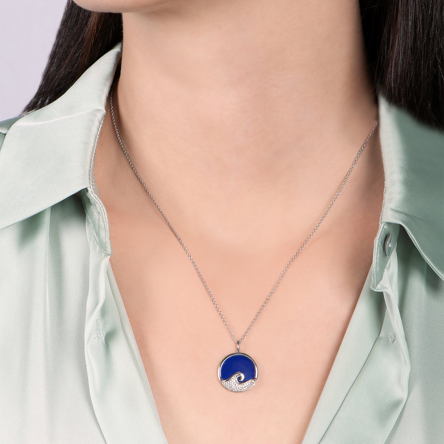 Enchanted Disney Fine Jewelry Sterling Silver 1/6 CTTW Diamond and Lapis Moana Wave Pendant Necklace