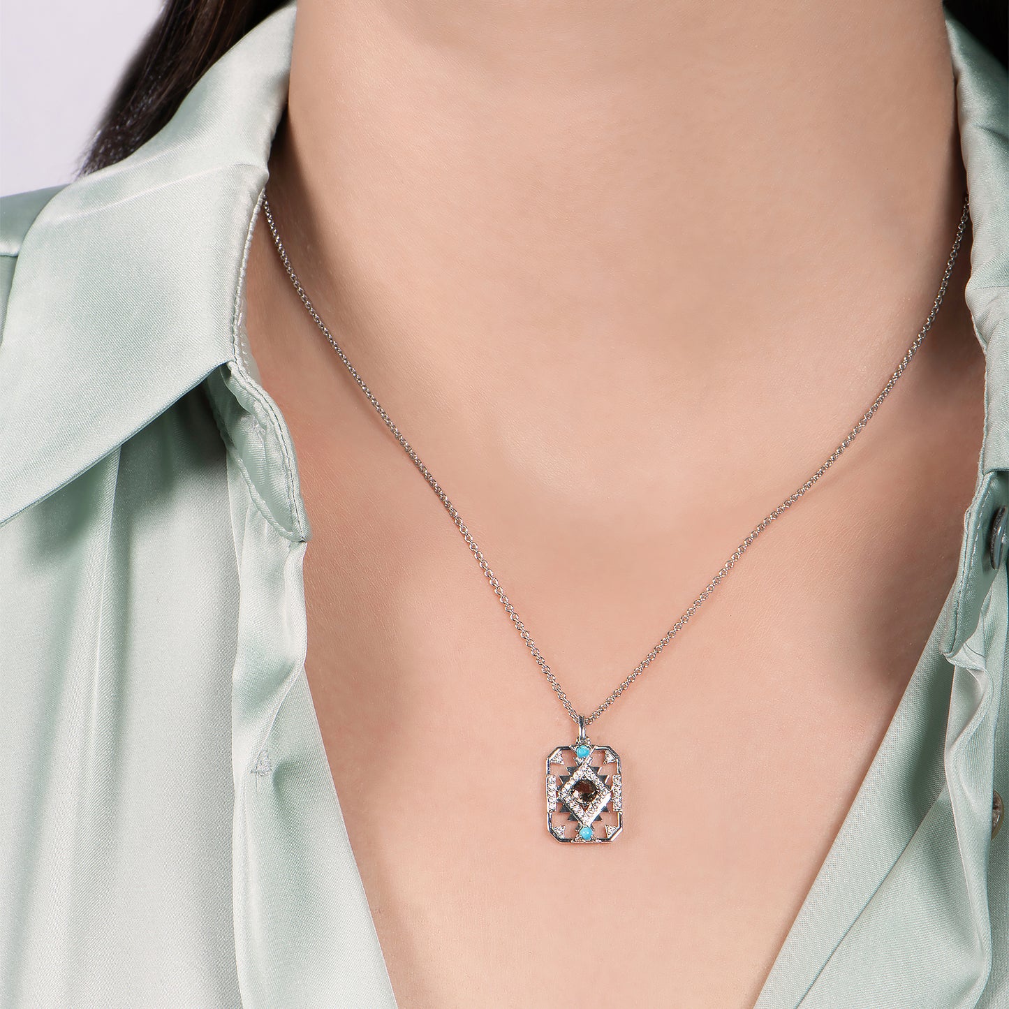 Enchanted Disney Fine Jewelry Sterling Silver with 1/8 CTTW Diamond with Smokey Quartz and Turquoise Pocahontas Pendant Necklace