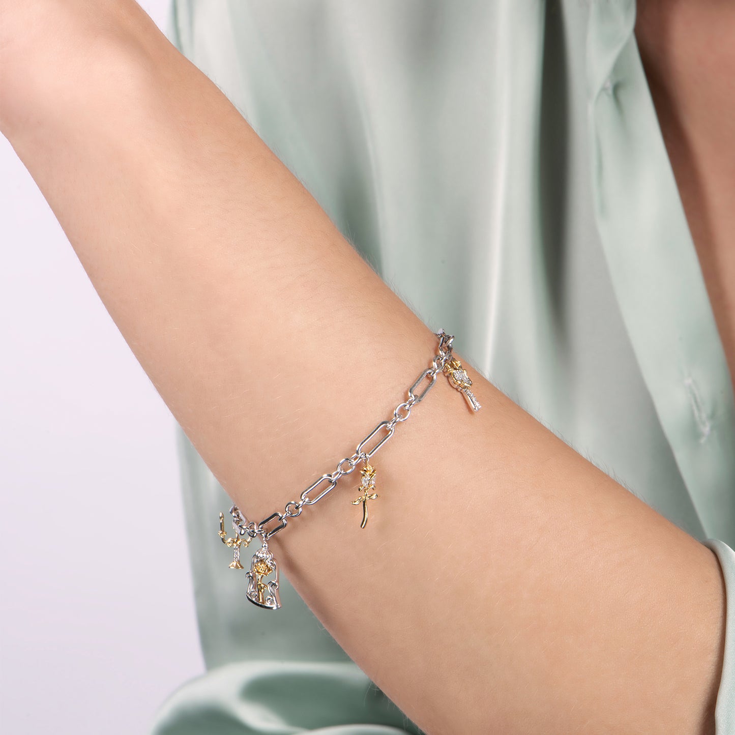 Enchanted Disney Fine Jewelry Sterling Silver and 10K Yellow Gold with 1/6 CTTW Diamonds, Belle Charm Bracelet