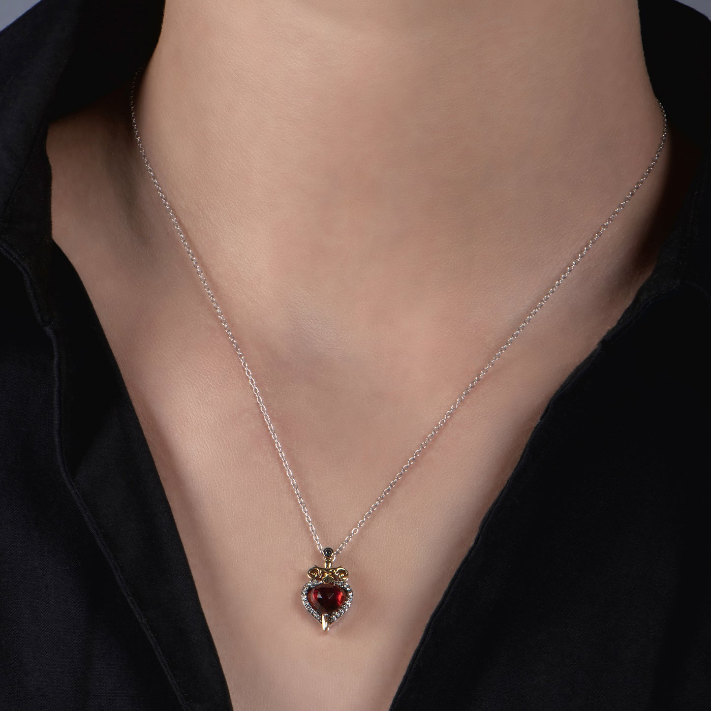 Enchanted Disney Fine Jewelry Black Rhodium Over Sterling Silver and 10K Yellow Gold with 1/10 CTTW Diamond and Red Garnet Evil Queen Pendant Necklace