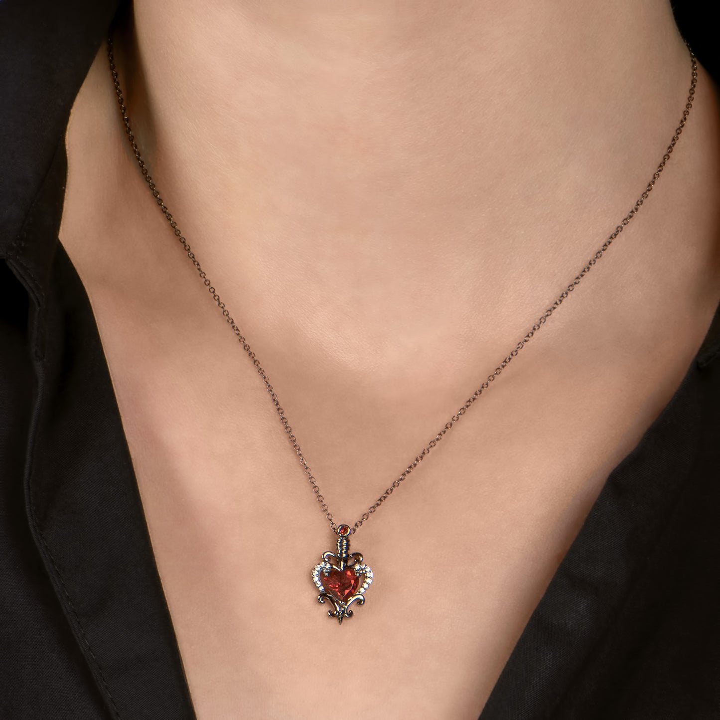 Enchanted Disney Fine Jewelry Black Rhodium over Sterling Silver with Diamond Accent and Red Garnet Evil Queen Dagger Pendant Necklace