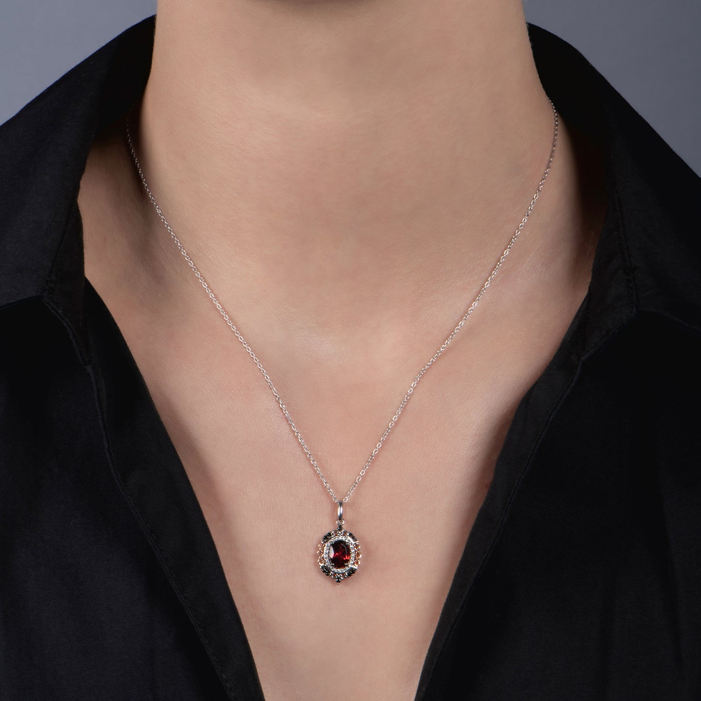 Enchanted Disney Fine Jewelry Sterling Silver and 10K Rose Gold with 1/5 CTTW Black and White Diamond with Red Garnet Evil Queen Pendant Necklace