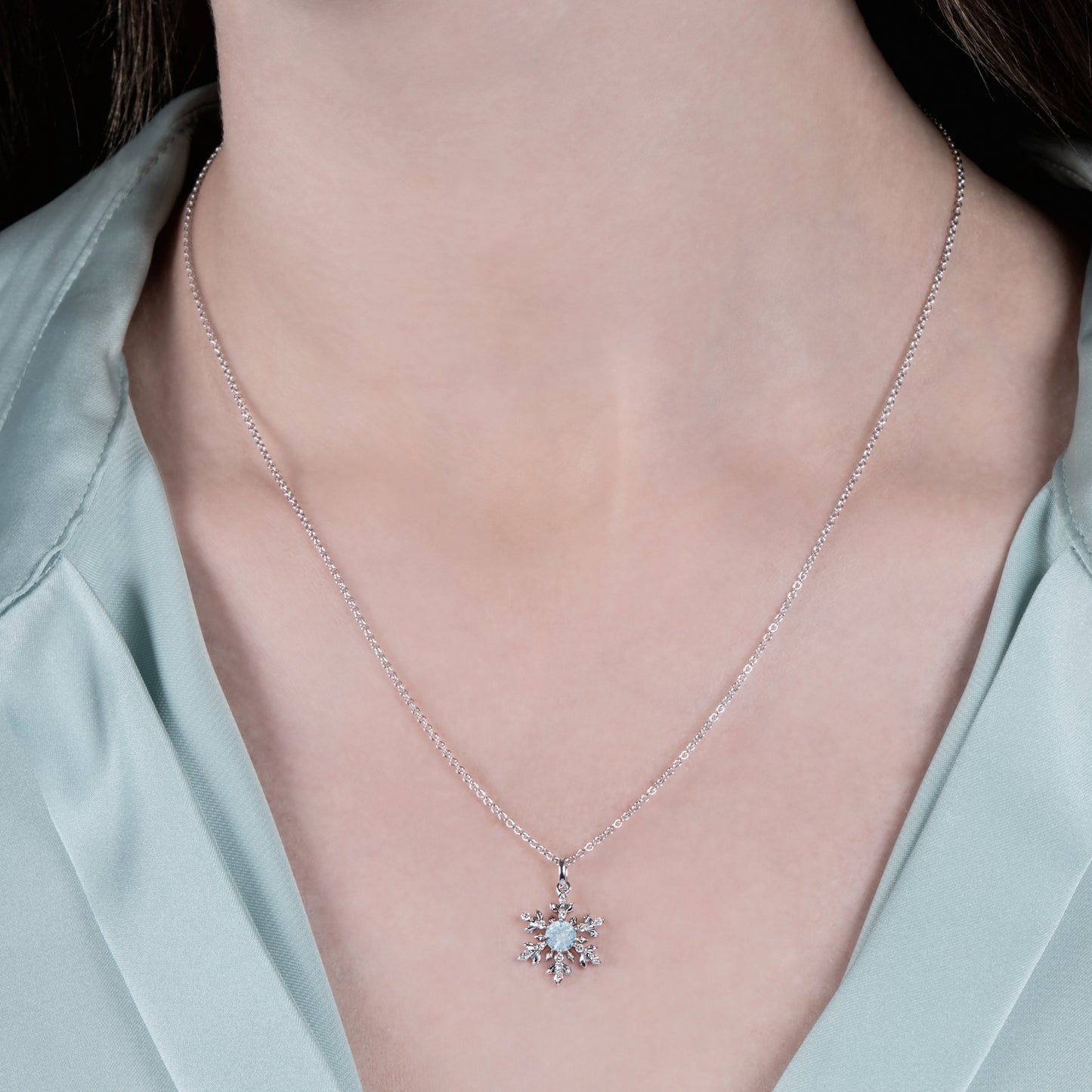 Enchanted Disney Fine Jewelry Sterling Silver with 1/12 CTTW Diamonds and Sky Blue Topaz Elsa Snowflake Pendant Necklace