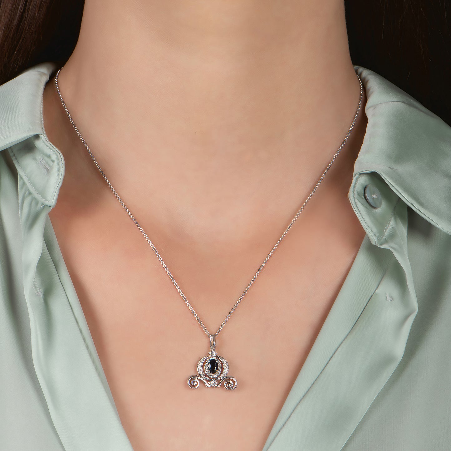 Enchanted Disney Fine Jewelry Sterling Silver with 1/6 CTTW Diamond and Blue Sapphire Cinderella Carriage Pendant Necklace