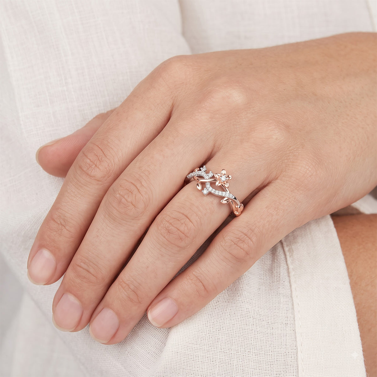 Enchanted Disney Fine Jewelry Sterling Silver and 10K Rose Gold with 1/10 CTTW Diamond Rapunzel Magical Flower Ring