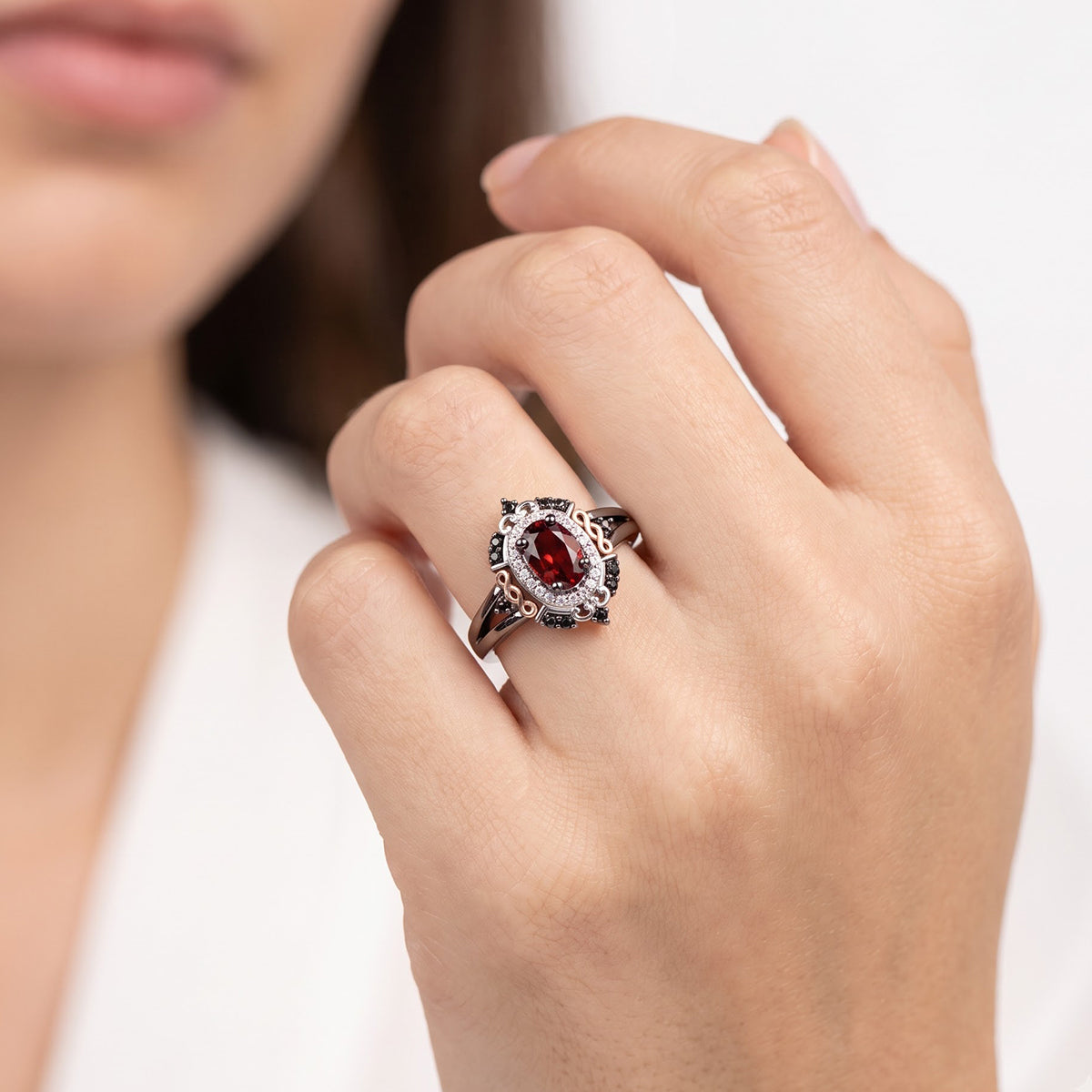 Enchanted Disney Fine Jewelry Black Rhodium over Sterling Silver and 10K Rose Gold 1/5 CTTW Black and White Diamond with Red Garnet Evil Queen Ring