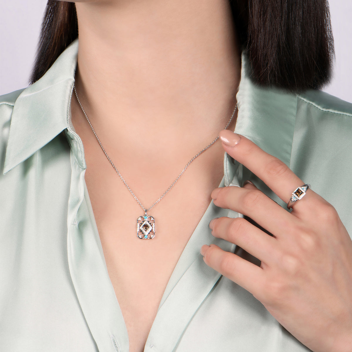 Enchanted Disney Fine Jewelry Sterling Silver with 1/10 CTTW Diamond with Smokey Quartz and Turquoise Pocahontas Ring