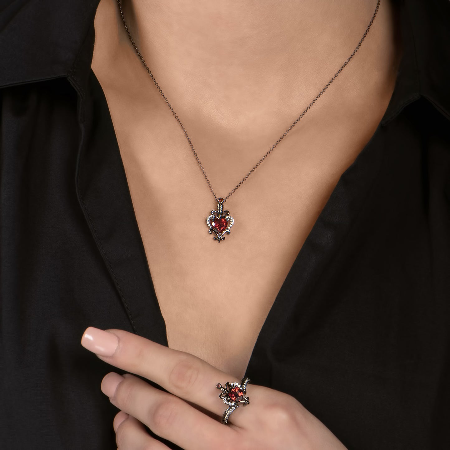 Enchanted Disney Fine Jewelry Black Rhodium over Sterling Silver Evil Queen with 1/10 CTTW Diamond and Red Garnet Dagger Ring