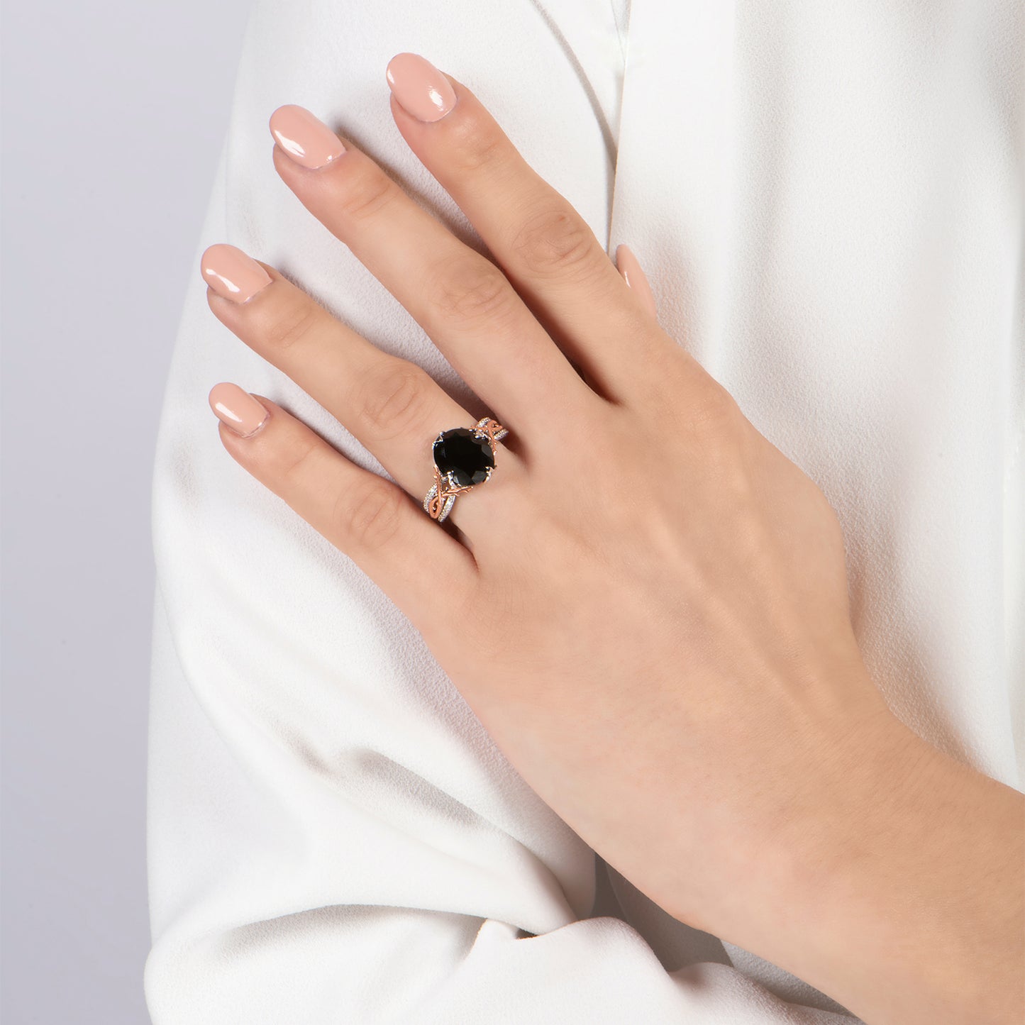 Enchanted Disney Fine Jewelry Sterling Silver and 10K Rose Gold with 1/10 CTTW and Black Onyx Maleficent Ring