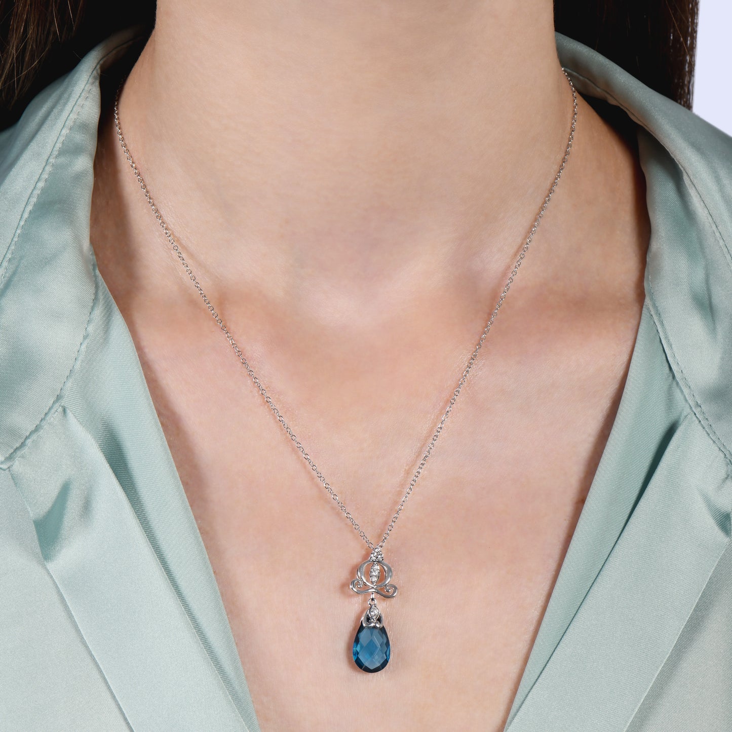 Enchanted Disney Fine Jewelry Sterling Silver with 1/20 CTTW Diamond and London Blue Topaz, Disney's Cinderella Necklace