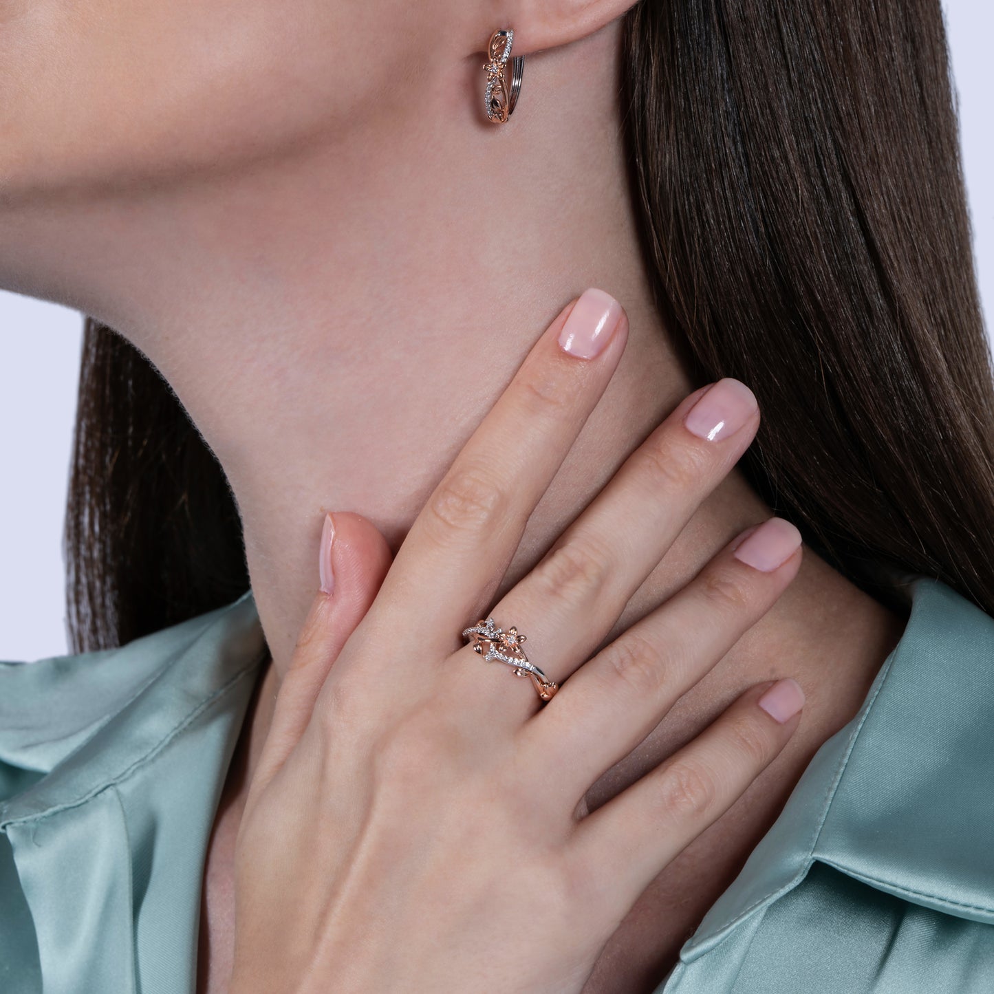 Enchanted Disney Fine Jewelry Sterling Silver and 10K Rose Gold with 1/10 CTTW Diamond Rapunzel Magical Flower Ring