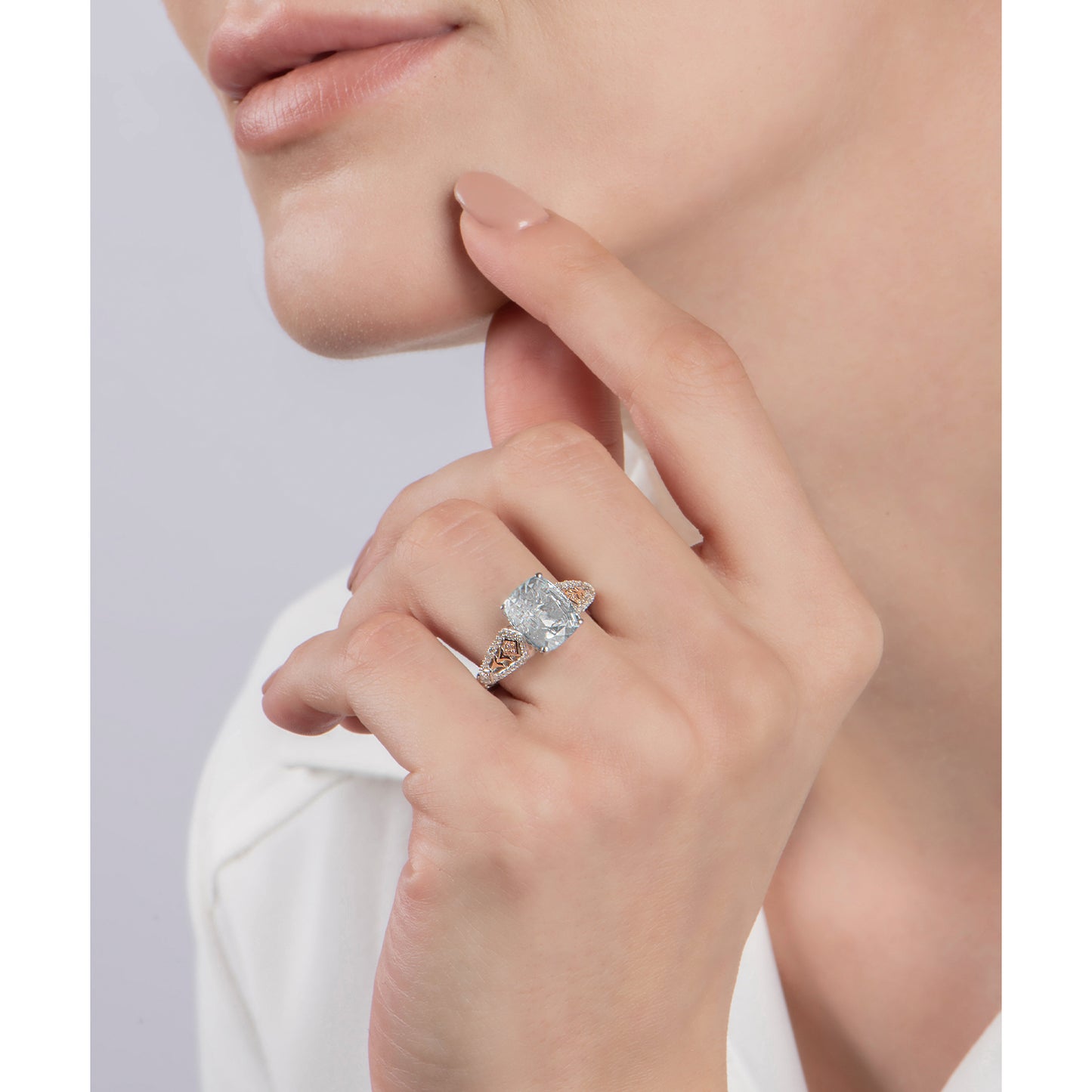 Enchanted Disney Fine Jewelry Sterling Silver and 10K Rose Gold with 1/6 CTTW Diamond with Aquamarine Elsa Ring